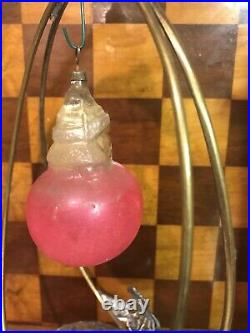German Antique Glass Figural Santa On A Pink Ball Christmas Ornament Unsilvered