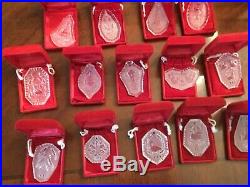 Waterford crystal ornaments 1978-1991. 14 Christmas designsall with cases